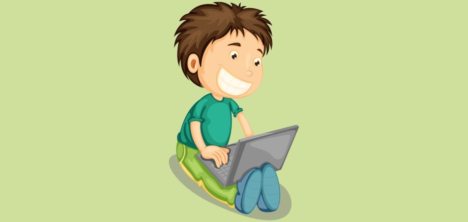 Ein Kind, das auf dem Boden sitzt und in einen Laptop schaut