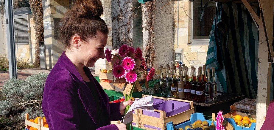 Frau Ritter am Marktstand