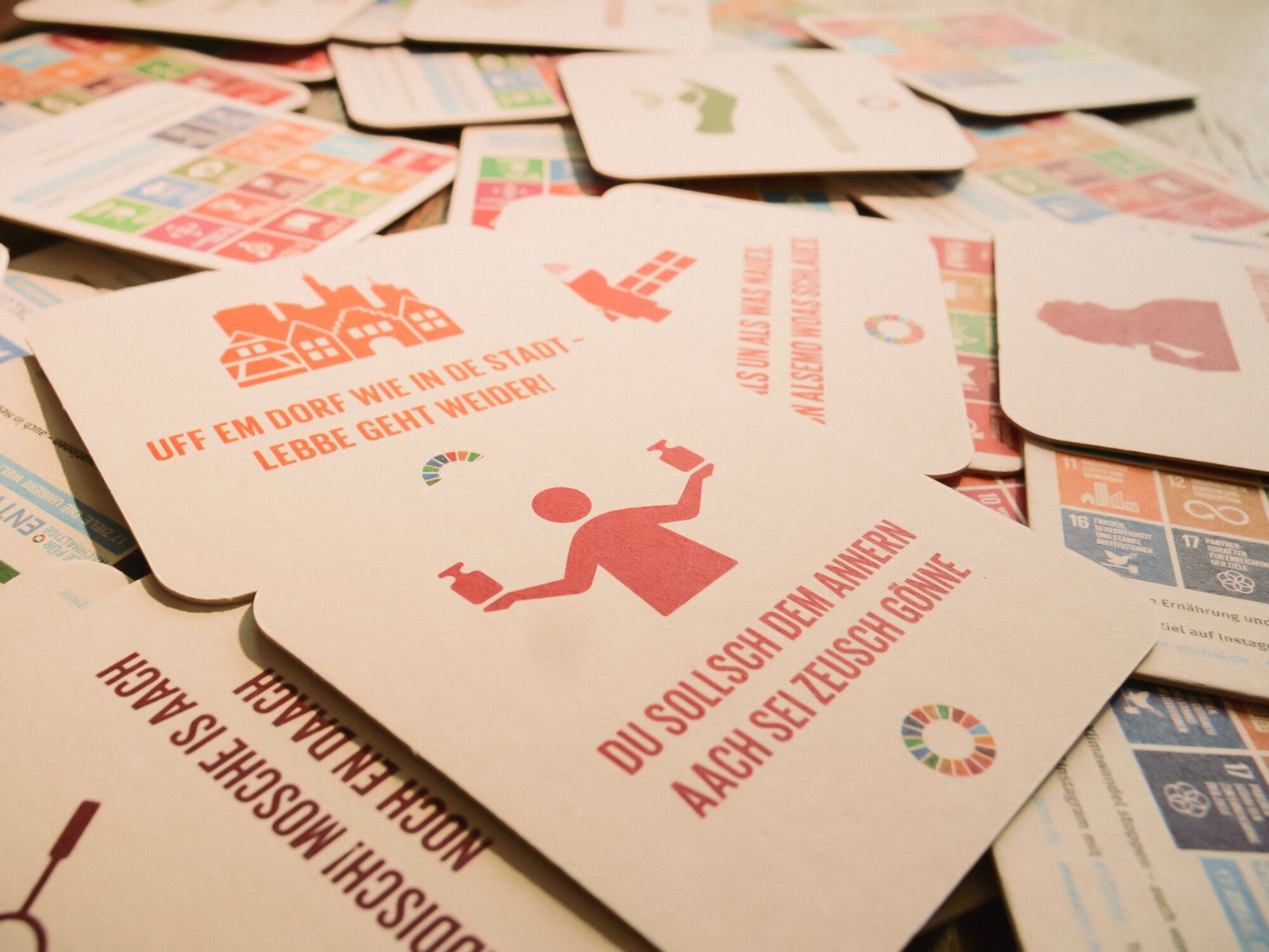 Bierdeckel mit unterschiedlichen Mundart-Texten